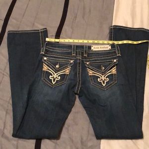 Excellent condition rock revival boot cut jeans.